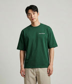 green-idealist-tee-joon-ho-front-portrait-sophisticated-essentials