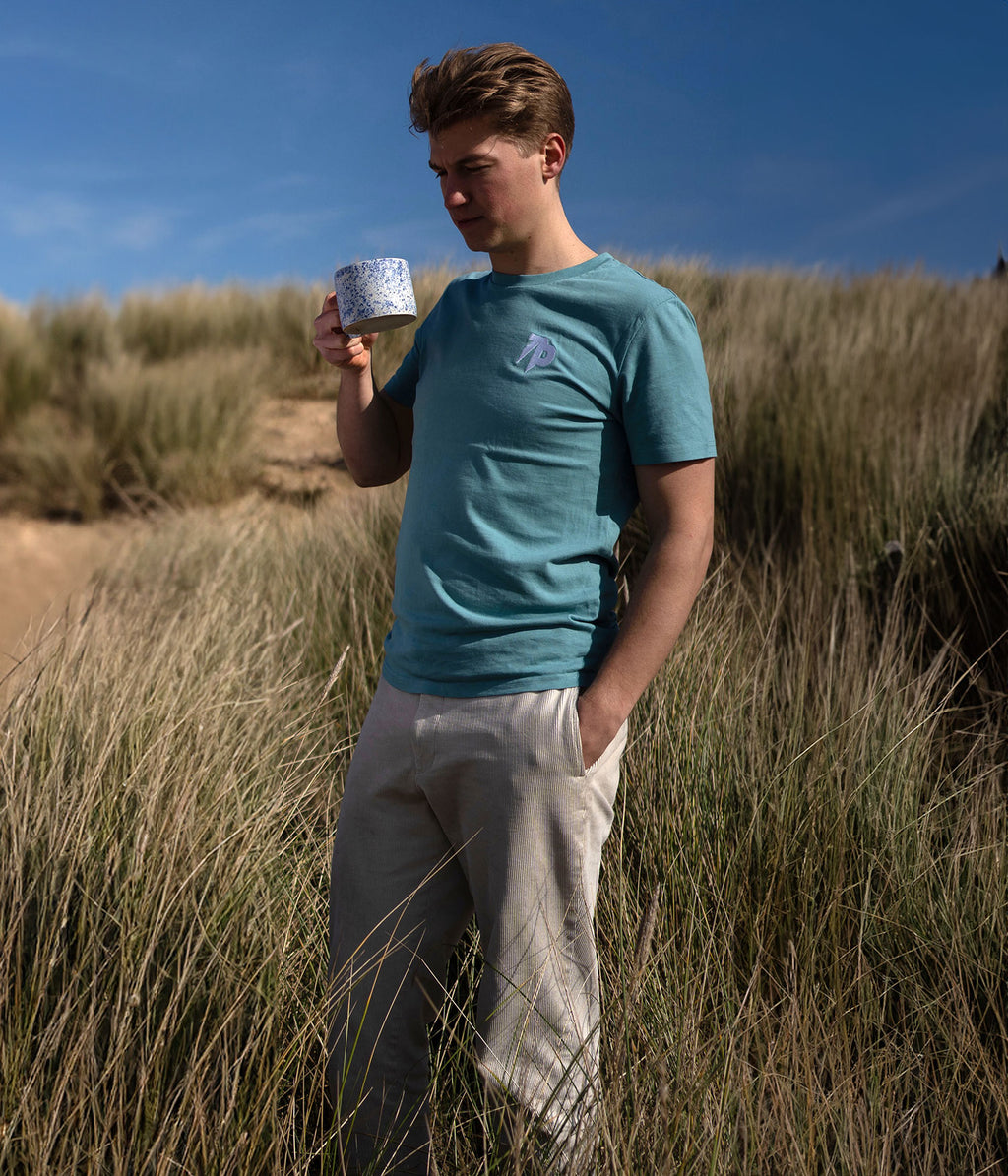Teal INTLS in Grass