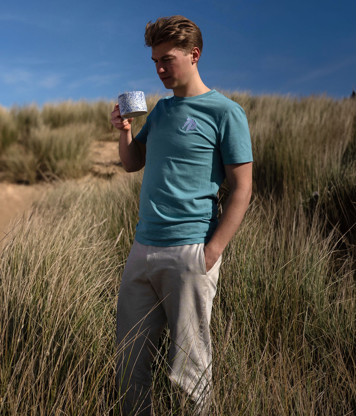 Teal INTLS in Grass